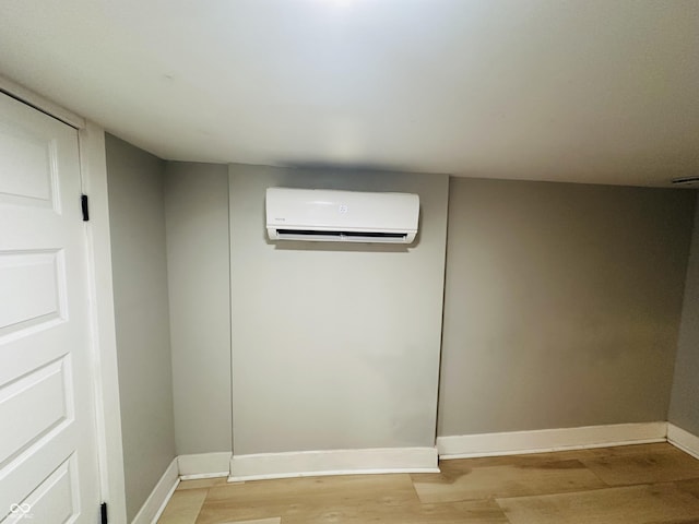 38 Hendricks Pl, Indianapolis, IN 46201 - detailed view of an AC wall unit and wood finished floors