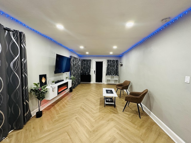 38 Hendricks Pl, Indianapolis, IN 46201 - living area featuring a warm lit fireplace and recessed lighting