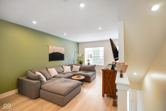 2125 Coretta Way, Indianapolis, IN 46202 - living area with light wood finished floors, recessed lighting, and baseboards