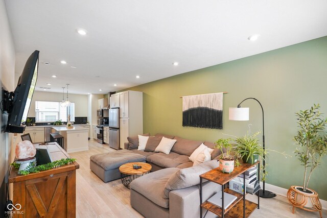 2125 Coretta Way, Indianapolis, IN 46202 - living area with light wood-style floors and recessed lighting