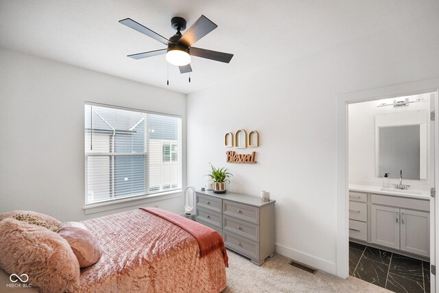 2125 Coretta Way, Indianapolis, IN 46202 - bedroom featuring a sink, baseboards, ensuite bathroom, and ceiling fan