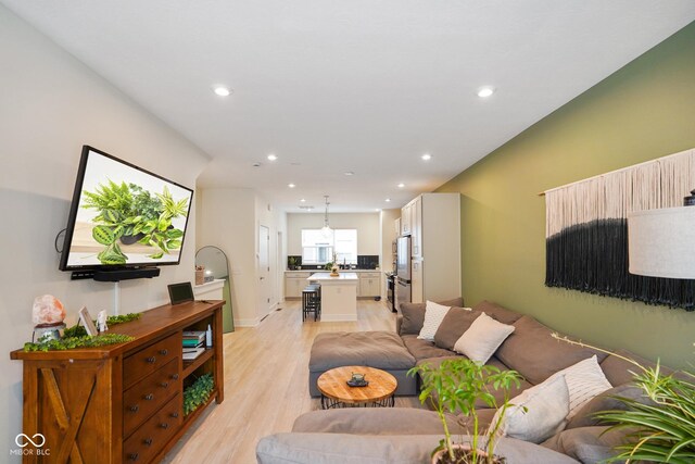2125 Coretta Way, Indianapolis, IN 46202 - living room featuring light wood-style floors and recessed lighting