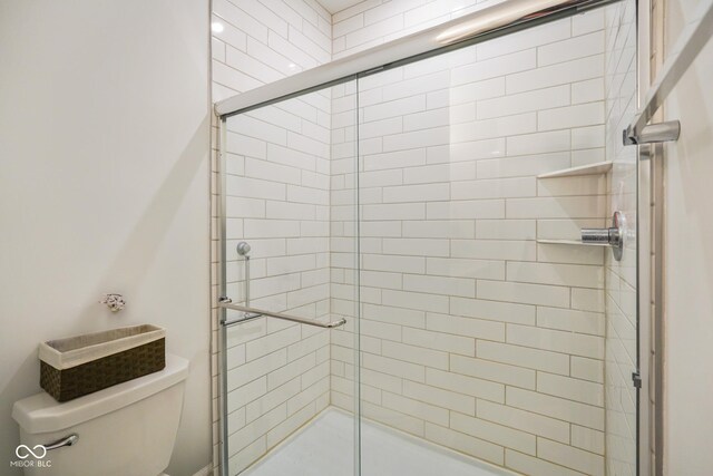 2125 Coretta Way, Indianapolis, IN 46202 - bathroom featuring toilet and a stall shower