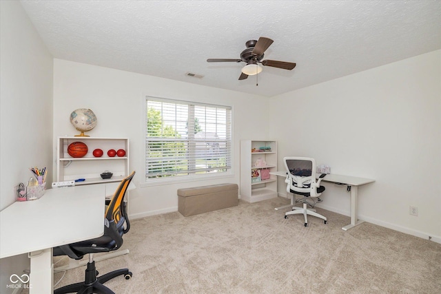 12772 Tram Ln, Carmel, IN 46032 - home office featuring carpet, a textured ceiling, and a ceiling fan