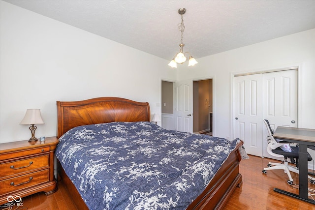 12772 Tram Ln, Carmel, IN 46032 - bedroom with wood finished floors and a closet