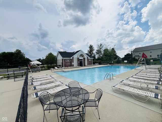 12772 Tram Ln, Carmel, IN 46032 - community pool featuring a patio