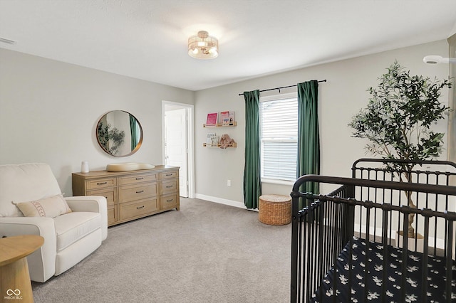 9716 Cimmaron Ave, Mccordsville, IN 46055 - bedroom with light colored carpet, a crib, and baseboards