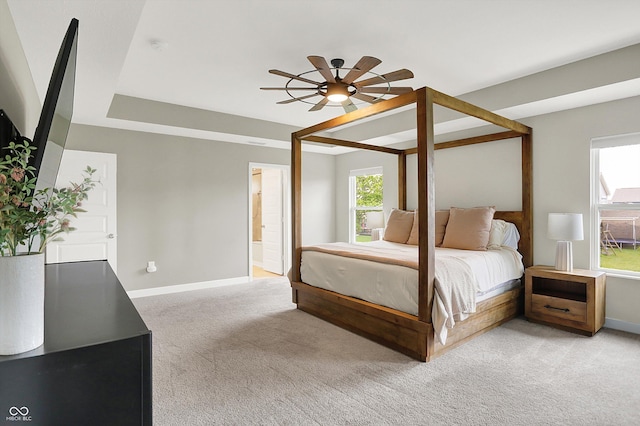 9716 Cimmaron Ave, Mccordsville, IN 46055 - bedroom featuring light colored carpet, baseboards, connected bathroom, and a ceiling fan