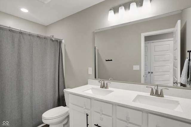 9716 Cimmaron Ave, Mccordsville, IN 46055 - bathroom with toilet, double vanity, recessed lighting, and a shower with curtain