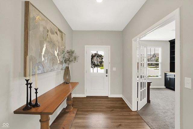9716 Cimmaron Ave, Mccordsville, IN 46055 - foyer featuring healthy amount of natural light, wood finished floors, and baseboards