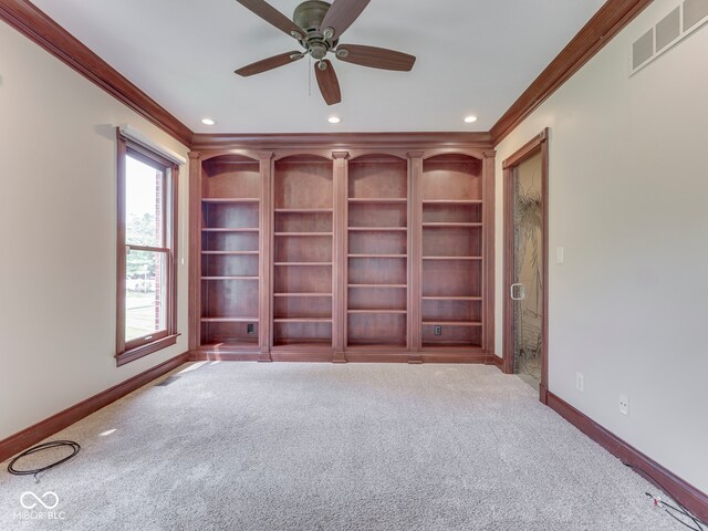 20 Forrests Edge Ct, Indianapolis, IN 46227 - carpeted spare room with crown molding, baseboards, recessed lighting, ceiling fan, and built in shelves