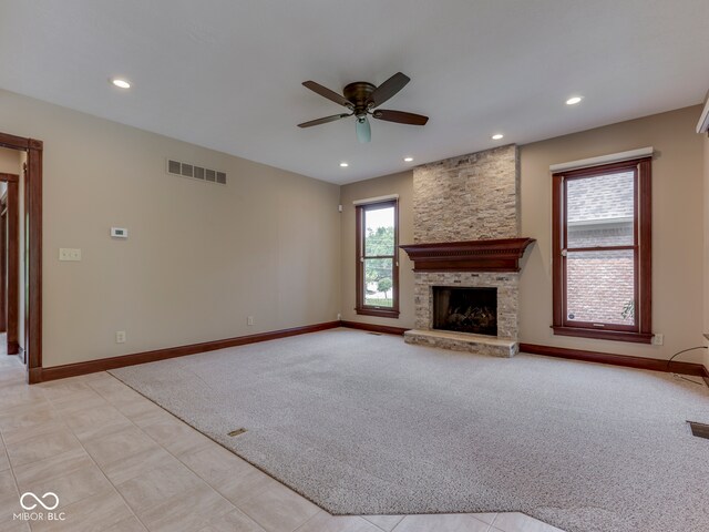 20 Forrests Edge Ct, Indianapolis, IN 46227 - unfurnished living room with light carpet, a ceiling fan, baseboards, recessed lighting, and a stone fireplace