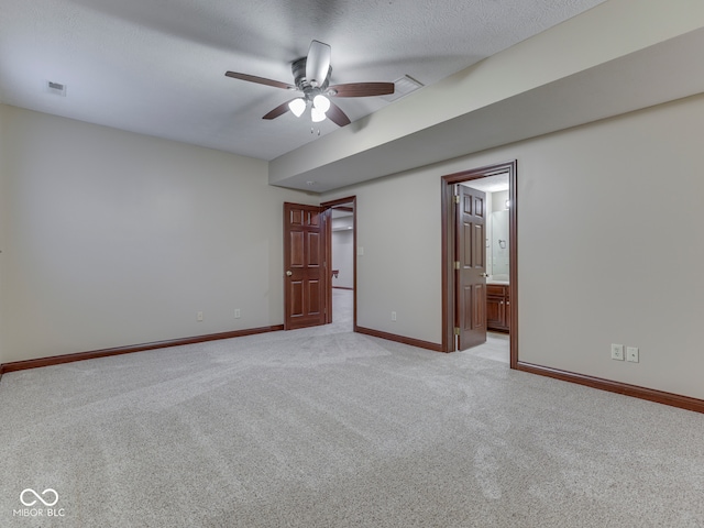 20 Forrests Edge Ct, Indianapolis, IN 46227 - unfurnished bedroom featuring light carpet, baseboards, and connected bathroom