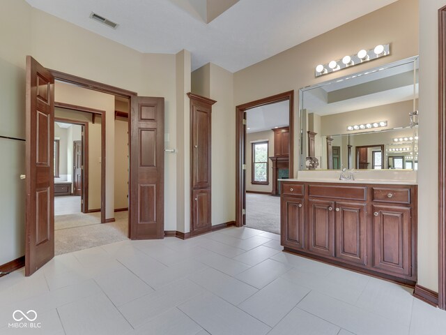 20 Forrests Edge Ct, Indianapolis, IN 46227 - bathroom featuring vanity, baseboards, and tile patterned flooring