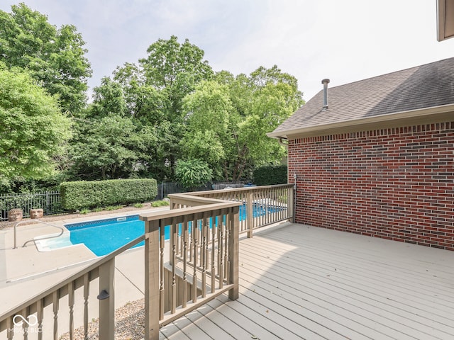 20 Forrests Edge Ct, Indianapolis, IN 46227 - view of swimming pool featuring a fenced backyard, a wooden deck, and view of scattered trees