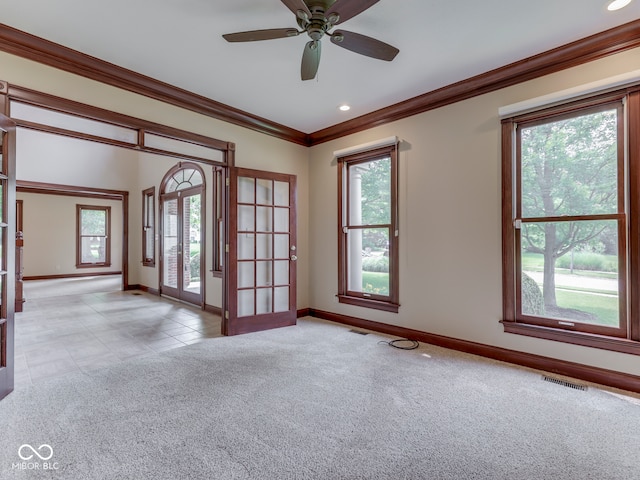 20 Forrests Edge Ct, Indianapolis, IN 46227 - unfurnished room with baseboards, plenty of natural light, light carpet, crown molding, and a ceiling fan