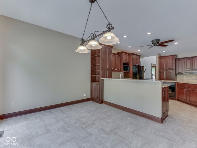 20 Forrests Edge Ct, Indianapolis, IN 46227 - kitchen with black appliances, light countertops, recessed lighting, ceiling fan, and a peninsula