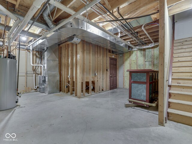 20 Forrests Edge Ct, Indianapolis, IN 46227 - unfinished basement featuring stairway, gas water heater, and heating unit