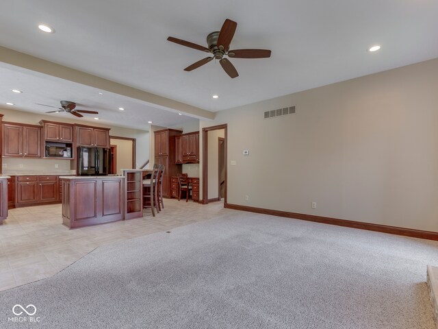 20 Forrests Edge Ct, Indianapolis, IN 46227 - kitchen with black appliances, ceiling fan, recessed lighting, light carpet, and a kitchen island