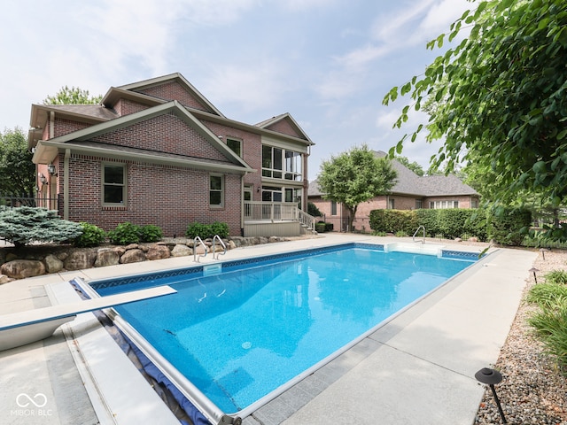 20 Forrests Edge Ct, Indianapolis, IN 46227 - view of swimming pool featuring a diving board