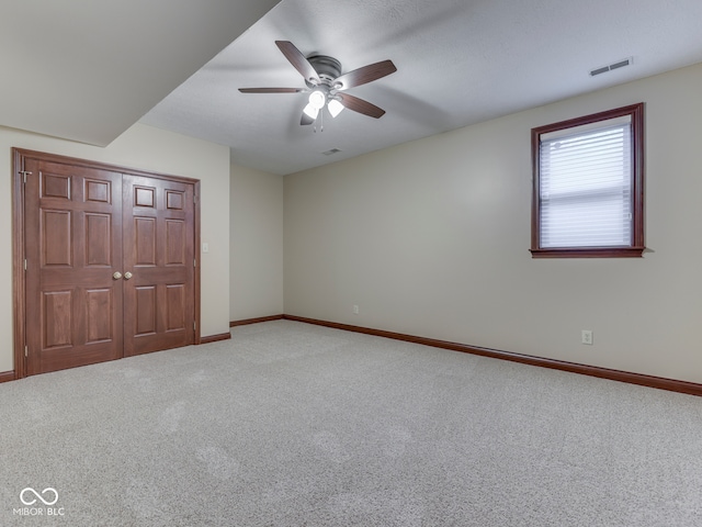20 Forrests Edge Ct, Indianapolis, IN 46227 - unfurnished bedroom with carpet floors, baseboards, ceiling fan, and a closet