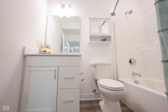 19800 Sutton Ter, Westfield, IN 46074 - full bathroom with toilet, vanity, shower / bath combo, wood finished floors, and baseboards