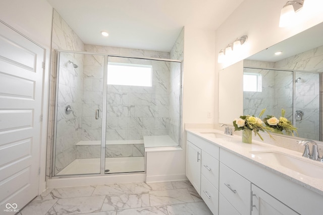 19800 Sutton Ter, Westfield, IN 46074 - bathroom with double vanity, a marble finish shower, marble look tiles, and baseboards