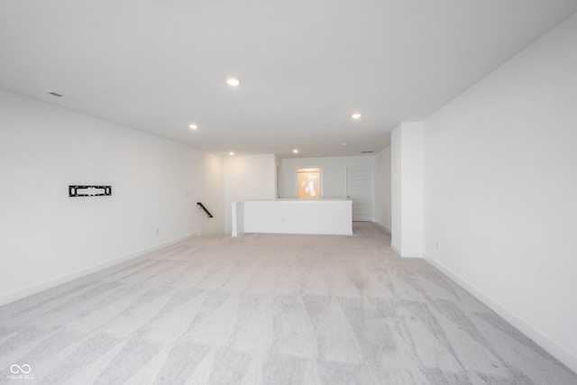 19800 Sutton Ter, Westfield, IN 46074 - unfurnished living room with recessed lighting, light colored carpet, and baseboards