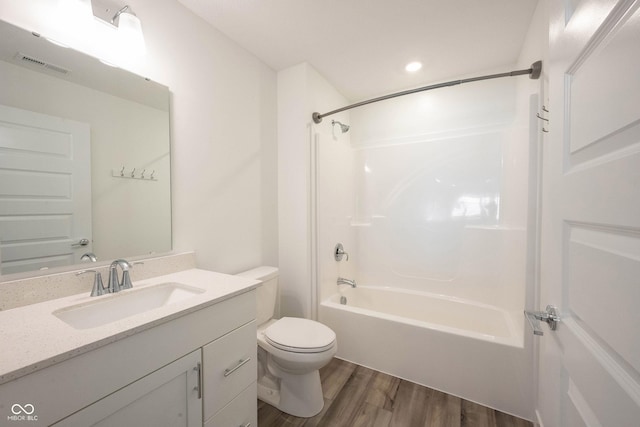 19800 Sutton Ter, Westfield, IN 46074 - bathroom featuring wood finished floors, toilet, vanity, bathing tub / shower combination, and recessed lighting