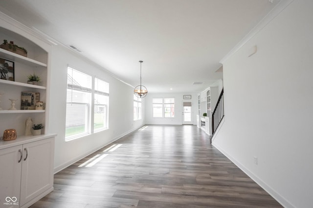 19800 Sutton Ter, Westfield, IN 46074 - unfurnished dining area featuring ornamental molding, a chandelier, wood finished floors, and baseboards