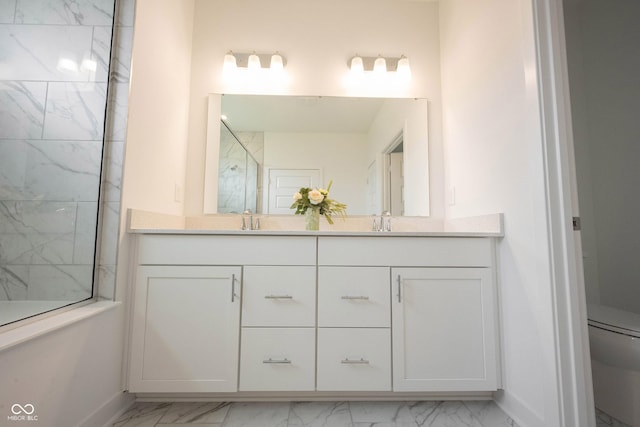 19800 Sutton Ter, Westfield, IN 46074 - bathroom featuring marble look tiles, double vanity, toilet, a marble finish shower, and baseboards