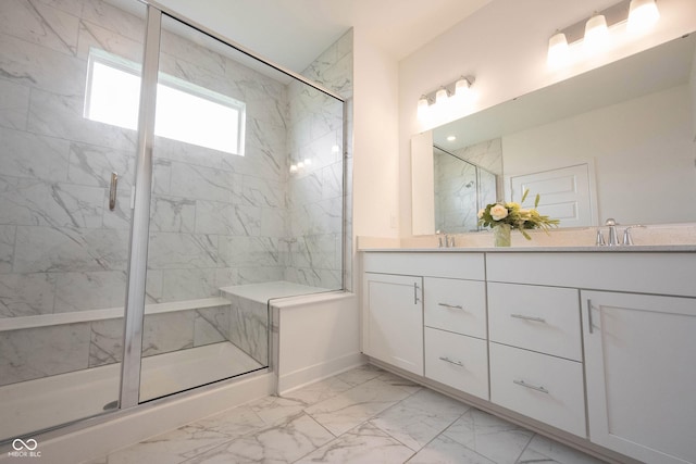 19800 Sutton Ter, Westfield, IN 46074 - bathroom featuring marble finish flooring, double vanity, a marble finish shower, and baseboards