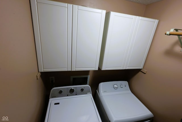 5654 Paradise Dr, Martinsville, IN 46151 - washroom with washer and dryer and cabinet space