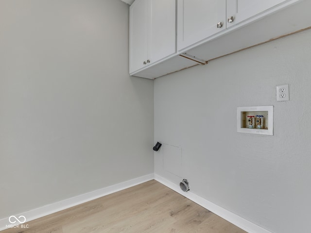 2756 Branigin Creek Blvd, Franklin, IN 46131 - laundry area featuring cabinet space, light wood-style flooring, baseboards, and washer hookup