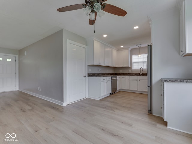 2756 Branigin Creek Blvd, Franklin, IN 46131 - kitchen with a sink, appliances with stainless steel finishes, light wood-style flooring, ceiling fan, and recessed lighting
