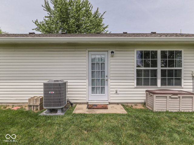 2756 Branigin Creek Blvd, Franklin, IN 46131 - doorway to property featuring central air condition unit and a lawn