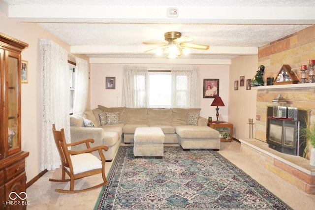 254 Bittersweet Dr, Whiteland, IN 46184 - living area with a ceiling fan, beamed ceiling, baseboards, and a stone fireplace