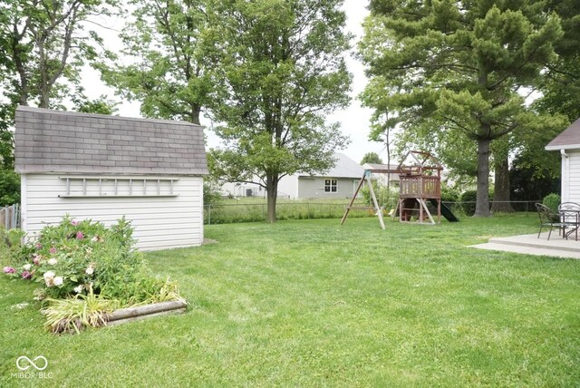 254 Bittersweet Dr, Whiteland, IN 46184 - view of yard featuring a playground and a patio area