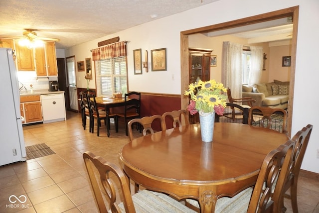 254 Bittersweet Dr, Whiteland, IN 46184 - dining space with light tile patterned floors and a textured ceiling