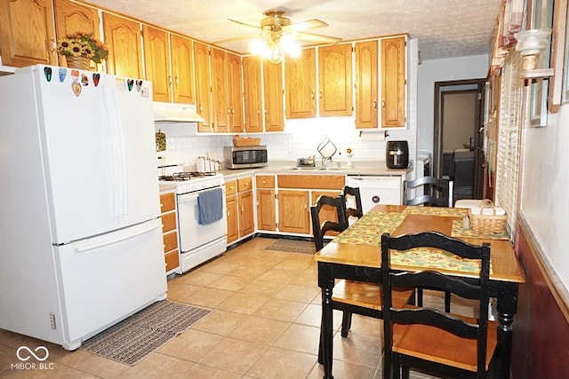 254 Bittersweet Dr, Whiteland, IN 46184 - kitchen with white appliances, light countertops, under cabinet range hood, ceiling fan, and backsplash