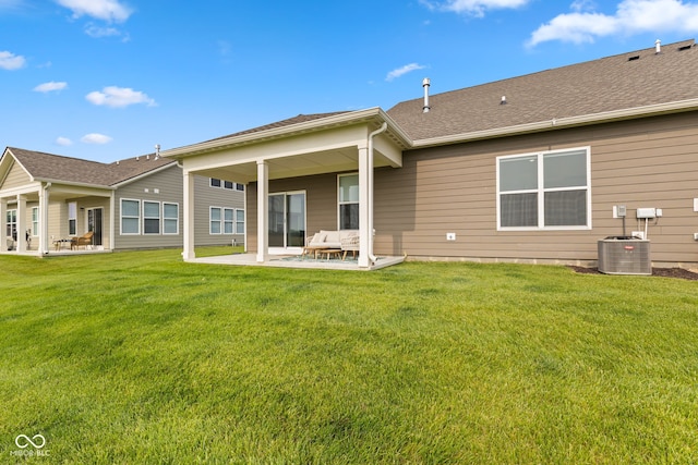 14848 Stonneger St, Westfield, IN 46074 - rear view of property with a patio area, a lawn, and a shingled roof