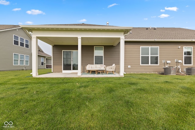 14848 Stonneger St, Westfield, IN 46074 - rear view of house with an outdoor living space, a patio area, central AC, a lawn, and a shingled roof