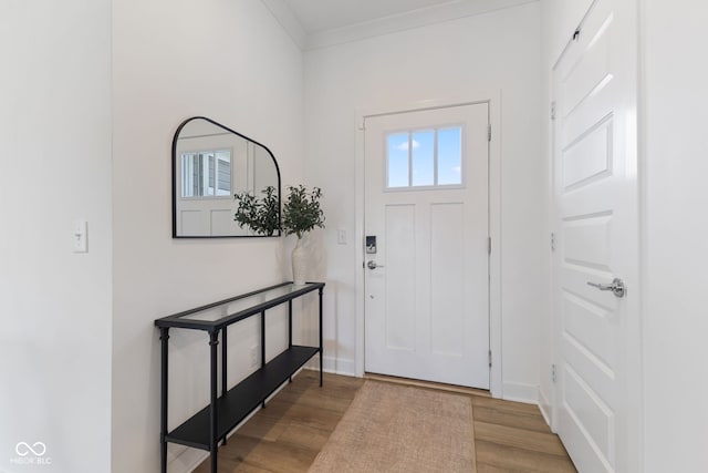 14848 Stonneger St, Westfield, IN 46074 - foyer featuring wood finished floors, ornamental molding, and baseboards