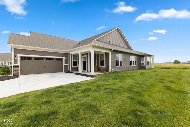 14848 Stonneger St, Westfield, IN 46074 - view of front of home with an attached garage, concrete driveway, a front yard, and roof with shingles