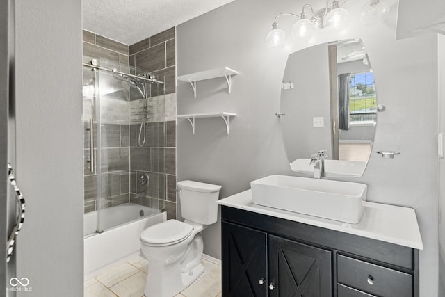 10693 Newgate Ln, Indianapolis, IN 46231 - full bath featuring toilet, vanity, shower / bath combination with glass door, and a textured ceiling