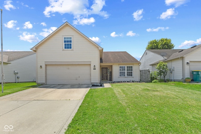 10693 Newgate Ln, Indianapolis, IN 46231 - traditional home with driveway, an attached garage, and a front lawn