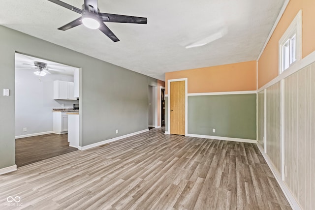 3898 S Randolph St, Indianapolis, IN 46227 - unfurnished room with light wood-style floors and ceiling fan