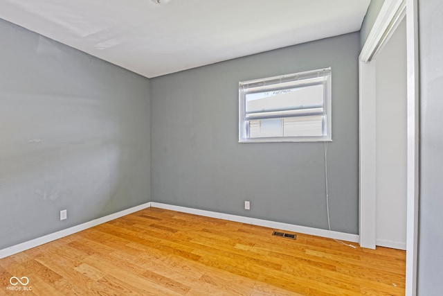 3898 S Randolph St, Indianapolis, IN 46227 - unfurnished bedroom with wood finished floors