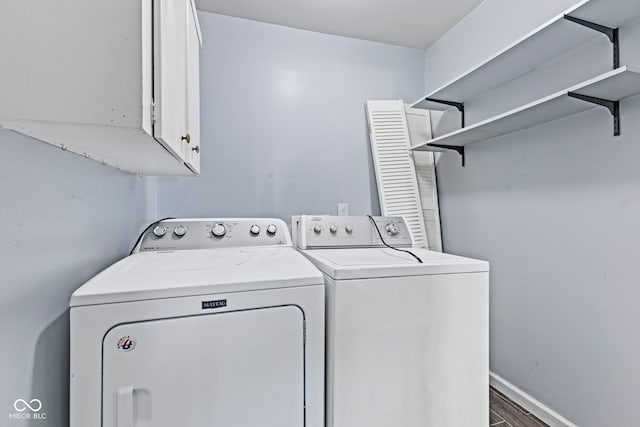 3898 S Randolph St, Indianapolis, IN 46227 - laundry area with washer and clothes dryer, cabinet space, and dark wood-type flooring