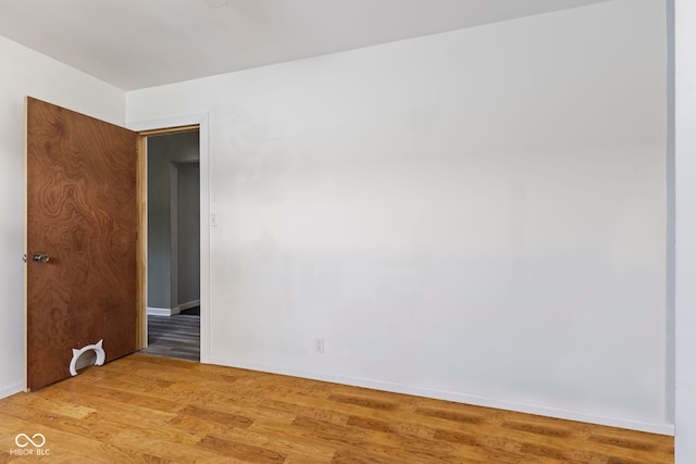 3898 S Randolph St, Indianapolis, IN 46227 - empty room featuring light wood-style flooring